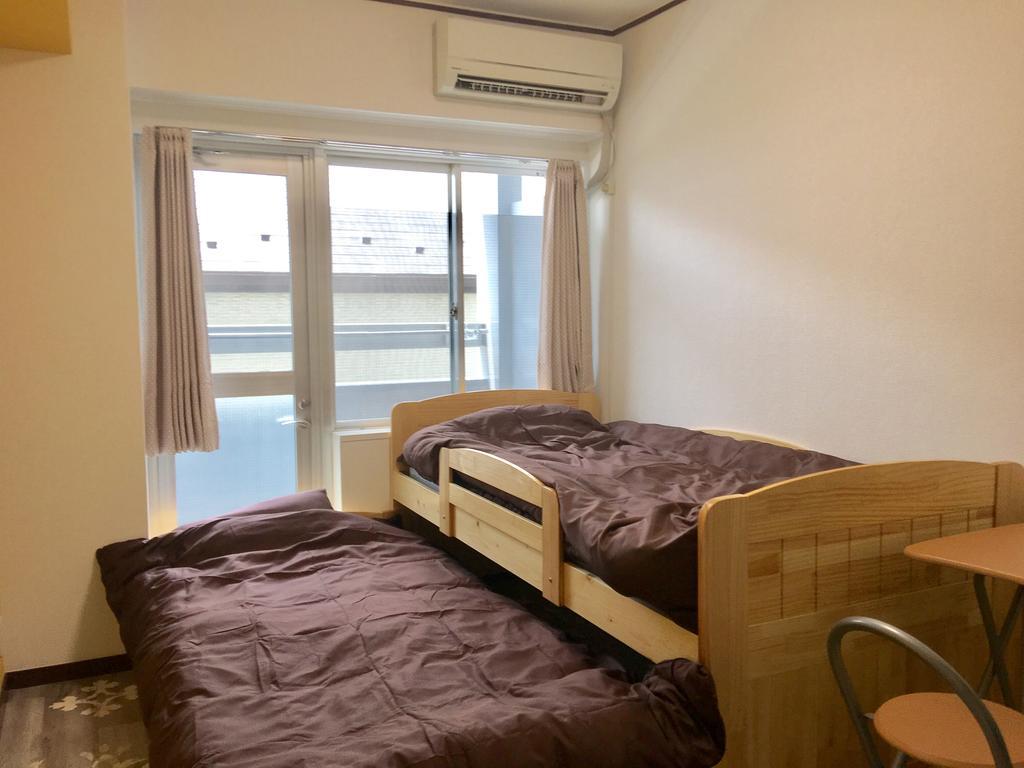 Guesthouse Origami Hiroshima Eksteriør billede